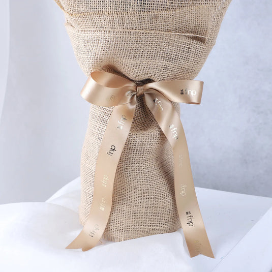 FNP- Blue Orchids Beautifully Tied Bunch