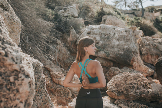 Sustainable activewear made out of recycled materials by Kosha Yoga Co. Squat proof, stretchable sports bras for yoga, gym, workouts, running.