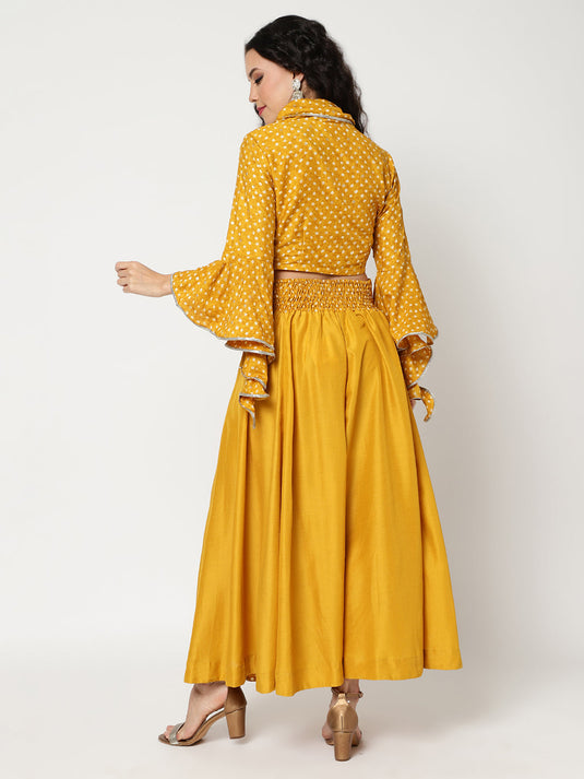 Bandhani Foil Printed Collared Crop Top Having Laces With Bell Sleeves And Solid Matching Flared Skirt Set