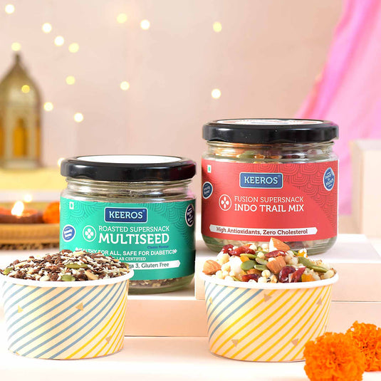 Keeros Healthy Bhai Dooj Gift Hamper for Brother with Roli Moli Chandan Tikka Chawal Mishri Pack | Combo of Sweet & Salted, Tasty & Nutritious Super Snacks in Glass Jars Packed in a Beautiful Gift Hamper