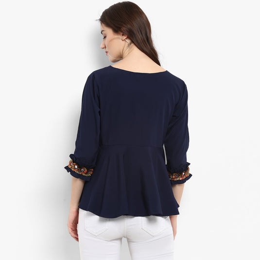 Solid Peplum Top With Multi color Lace At The Sleeves