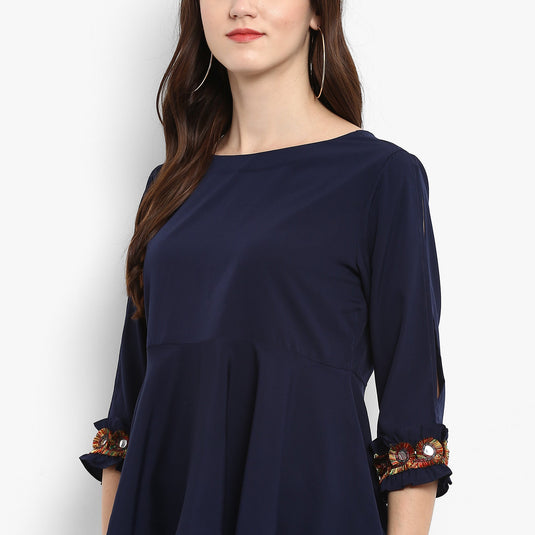 Solid Peplum Top With Multi color Lace At The Sleeves