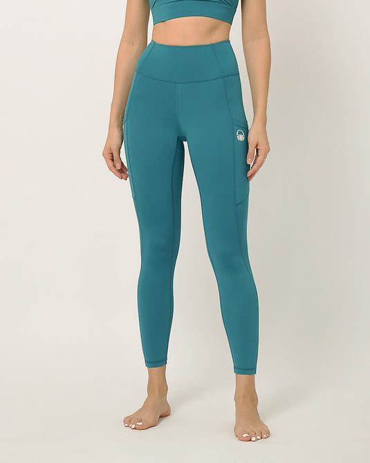 Sustainable activewear made out of recycled materials by Kosha Yoga Co. Squat proof, stretchable leggings for yoga, gym, workouts, running.