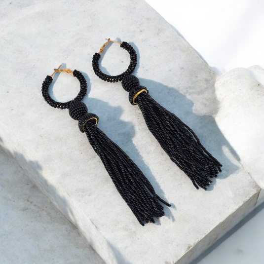 Elegant Black Beaded Hoop Earrings with Tassel Detail