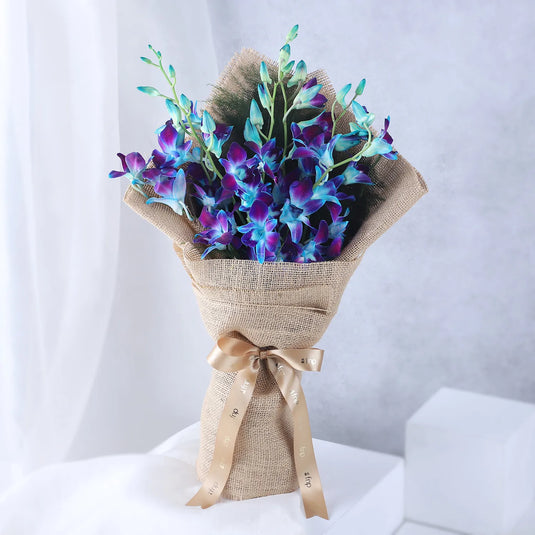 FNP- Blue Orchids Beautifully Tied Bunch