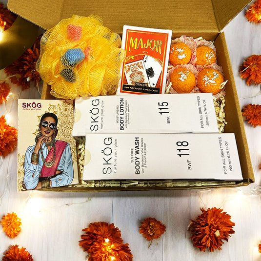 PHULJHADI BODY BOX with SKOG Body Wash, SKOG Body Lotion with wine grape, Hyaluronic Acid, French Lavender, Loofah, Diwali playing cards, laddu candles and custom Diwali wish card - luxurious Diwali gift